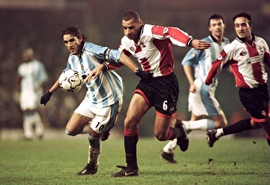 Intense Battle for Possession: Hadji vs. Richards at Highfield Road (Coventry City vs. Southampton, FA Premiership)