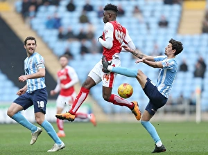 Images Dated 2016 February: Intense Clash: Coventry City vs Fleetwood Town in Sky Bet League One at Ricoh Arena