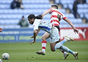 Images Dated 2015 March: Intense Clash: Dean Furman vs. Dominic Samuel - Coventry City vs Doncaster Rovers
