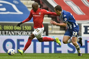 Intense Clash: Fortune vs Vuckic in Wigan Athletic vs Coventry City, Sky Bet League One