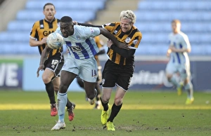 Images Dated 2015 March: Intense Clash: Nouble vs McGivern in Coventry City vs Port Vale (Sky Bet League One)