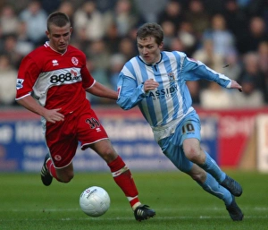 Intense FA Cup Showdown: McSheffrey vs. Cattermole's Battle for Ball Possession (Coventry City vs. Middlesbrough, 2006, Round 4)