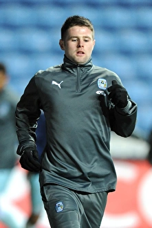 14-02-2012 V Leeds United, Ricoh Arena Prints: Intense Focus: Oliver Norwood vs
