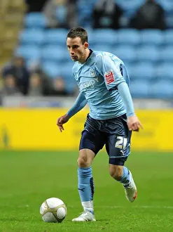 Images Dated 2010: Intense Moment: Michael McIndoe in FA Cup Third Round Replay Action for Coventry City vs Portsmouth at Ricoh Arena