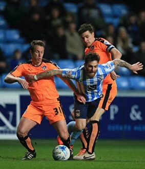 Images Dated 29th March 2016: Intense Moment: Romain Vincelot of Coventry City Charges Forward Against Nicky Shorey