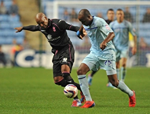 Images Dated 2012 August: Intense Rivalry: Coventry City vs Birmingham City in Capital One Cup Second Round at Ricoh Arena