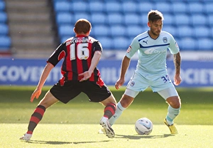 Images Dated 2012 October: Intense Rivalry: Coventry City vs Bournemouth in Npower Football League One at Ricoh Arena