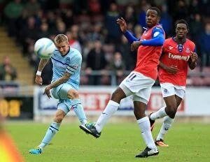 Images Dated 15th September 2013: Intense Rivalry: Coventry City vs Gillingham - A Battle for Supremacy in Sky Bet League 1