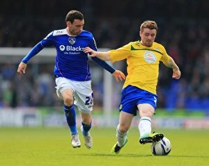 Images Dated 21st April 2014: Intense Rivalry: David Worrall vs John Fleck Clash in Oldham Athletic vs Coventry City Football