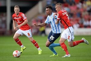 Images Dated 22nd August 2015: Intense Rivalry: Demetriou vs Murphy Clash in Walsall vs Coventry City Football Match