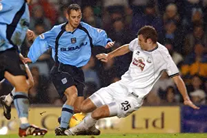 Images Dated 2002: Intense Rivalry: Evatt vs. Partridge Tackle in Derby County vs