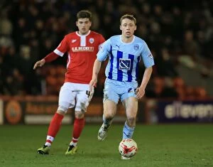 Sky Bet League One - Barnsley v Coventry City - Oakwell Collection: Intense Rivalry: George Waring vs Matthew Pennington's Battle for Supremacy in Sky Bet League One