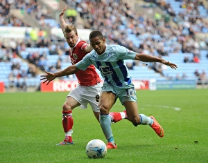 Images Dated 2014 October: Intense Rivalry: Jackson vs. Elliott Battle in Coventry City vs