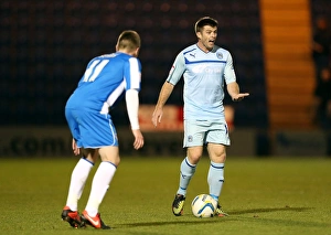 Images Dated 2012 November: Intense Rivalry: Jennings vs. Sears in Coventry City's Npower League One Showdown against Colchester United