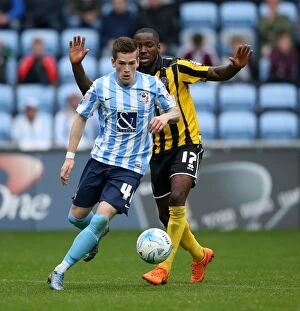 Images Dated 3rd October 2015: Intense Rivalry: Kent vs Ogogo's Battle for Possession in Coventry City vs Shrewsbury Town