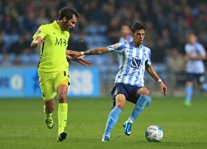 Images Dated 31st August 2015: Intense Rivalry: Lameiras vs. Atkinson's Battle for Possession in Coventry City vs