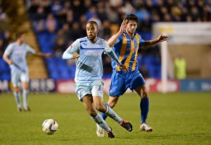 Shrewsbury Town V Coventry City - Greenhous Meadow : 18-09-2012 Prints: Intense Rivalry: McGoldrick vs Jacobson - A Battle for Supremacy in Coventry City's Npower League One Clash against
