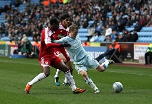 Images Dated 21st January 2012: Intense Rivalry: McSheffrey vs. Haroun & Hoyte - Coventry City vs