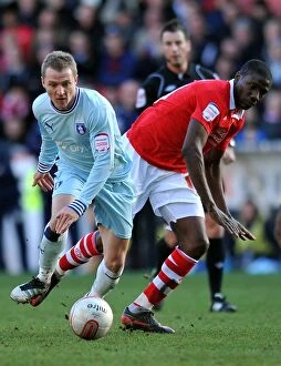 Images Dated 18th February 2012: Intense Rivalry: McSheffrey vs Moussi - Coventry City vs Nottingham Forest's Battle for Supremacy