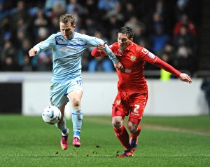 Images Dated 2013 February: Intense Rivalry: McSheffrey vs Tootle in the Johnstones Paint Trophy Northern Final Showdown