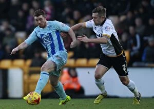 Sky Bet League One - Port Vale v Coventry City - Vale Park Collection: Intense Rivalry: A Moment of Tension Between Adam Yates and John Fleck in Sky Bet League One Clash