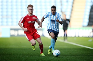 Images Dated 2015 September: Intense Rivalry: Murphy vs. O'Neil - Coventry City vs