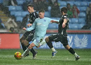 Images Dated 2012: Intense Rivalry: Norwood vs. Drury and Cresswell in Coventry City vs