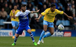 Images Dated 2015 March: Intense Rivalry: Payne vs. Samuel - Sky Bet League One Showdown between Peterborough United and Coventry City