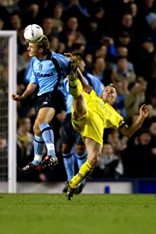 Images Dated 2003: Intense Rivalry: Peed vs Kavanagh's Battle for Ball in Coventry City's FA Cup Clash against Cardiff City