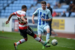Images Dated 2015 March: Intense Rivalry: Reece Wabara vs Chris Stokes Battle at Coventry City's Ricoh Arena (Sky Bet League One)
