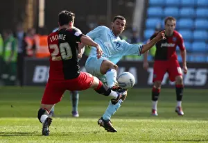 Images Dated 2012 March: Intense Rivalry: Thomas vs. Thorne in Coventry City vs