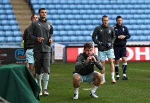 Images Dated 21st January 2012: Intense Warm-Up: Coventry City FC Gears Up for Championship Clash vs