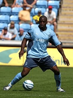Images Dated 9th August 2009: Isaac Osbourne in Action: Coventry City vs Ipswich Town (Championship Clash at Ricoh Arena)