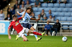 Jacob Murphy's Shot vs. Oliver Turton's Tackle: A Sky Bet League One Moment at Coventry City's Ricoh Arena