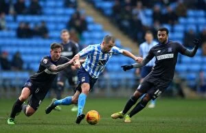 Images Dated 13th February 2016: Joe Cole Battles Past Bury Defenders in Coventry City's League One Clash