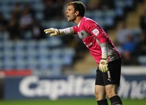 Images Dated 28th August 2012: Joe Murphy Rallies Coventry City: Capital One Cup Showdown vs Birmingham City at Ricoh Arena