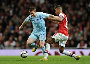 Capital One Cup : Round 3 : Arsenal V Coventry City : Emirates Stadium : 26-09-2012 Prints: John Fleck vs Martin Angha: Intense Clash in Arsenal vs Coventry City Capital One Cup Match