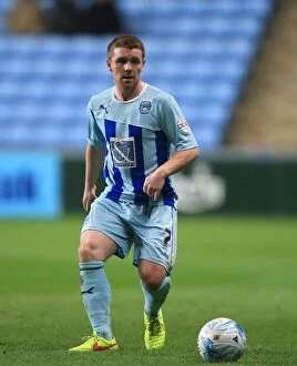 Images Dated 1st April 2015: John Fleck's Unyielding Spirit: Coventry City vs Leyton Orient in Sky Bet League One at Ricoh Arena