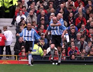 14-04-2001 v Manchester United Collection: John Hartson's Double Strike: Coventry City's Glorious Victory Over Manchester United at Old