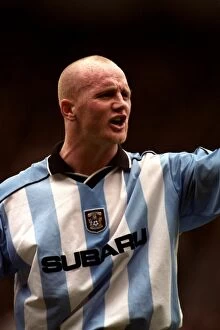 14-04-2001 v Manchester United Collection: John Hartson's Epic Battle at Old Trafford: Coventry City vs. Manchester United (14-04-2001)