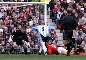 14-04-2001 v Manchester United Collection: John Hartson's Stunner: Coventry City's Shocking FA Carling Premiership Victory Against Manchester