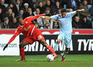 Images Dated 2013 February: Johnstones Paint Trophy Northern Final Showdown: A Battle Between Cyrus Christie and Chuks Aneke