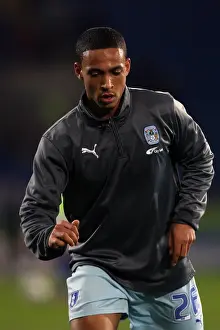 Images Dated 2012 March: Jordan Clarke vs. Cardiff City: A Fierce Face-Off at Npower Championship (21-03-2012)