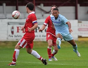Images Dated 4th August 2012: Jordan Clarke's Determined Strike: Coventry City's Pre-Season Clash at Accrington Stanley's Crown