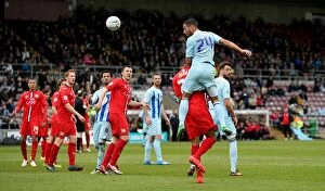 Images Dated 5th April 2014: Jordan Clarke's Dramatic Header: Coventry City Secures Victory Over Milton Keynes Dons
