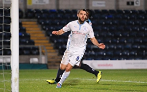 Prints of Coventry Citys Josh McQuoid celebrates after scoring the opening goal of the game against Wycombe Wanderers during the Johnstones Paint Trophy match at Adam Park, Wycombe Johnstone's Paint Trophy Prints: Josh McQuoid's Game-Opening Goal: Coventry City vs