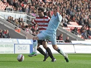 29-10-2011 v Doncaster Rovers, Keepmoat Stadium Collection: Keogh vs. Barnes: Intense Rivalry in Coventry City vs. Doncaster Rovers Npower Championship Clash