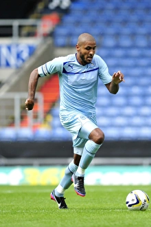 Images Dated 2013 July: Leon Clarke Leads Coventry City in Friendly Clash against Oxford United at Kassam Stadium (July 27)