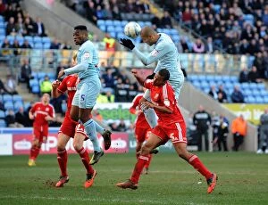 Images Dated 2nd March 2013: Leon Clarke Wins the Ball: Coventry City vs Swindon Town, Npower League One, Ricoh Arena