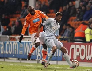 31-01-2012 v Blackpool, Bloomfield Road Collection: Lualua vs. Christie: A Championship Showdown at Bloomfield Road (January 31, 2012) - Blackpool vs